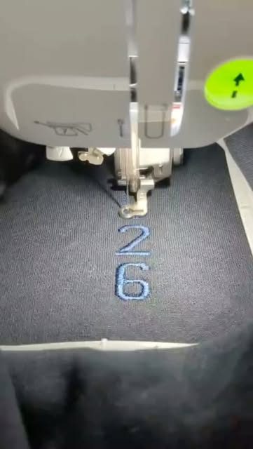A number being embroidered onto a garment