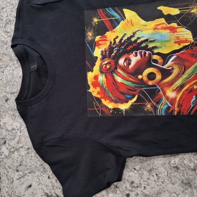 A vivid illustrated portrait printed on a black t-shirt